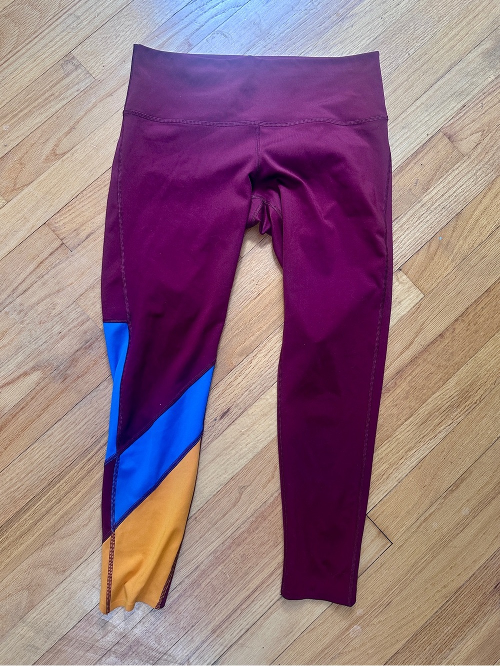 cotopaxi Maroon Leggings with Blue and Mustard Colorblock